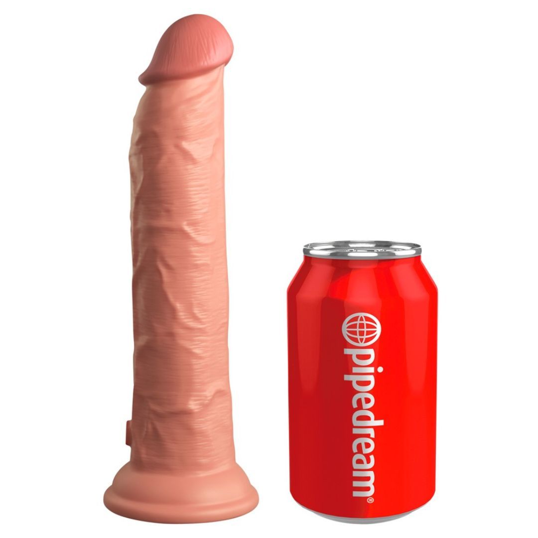Rosa Dildo neben roter Getränkedose. Dildo mit geriffelter Oberfläche. Dose mit Logo.