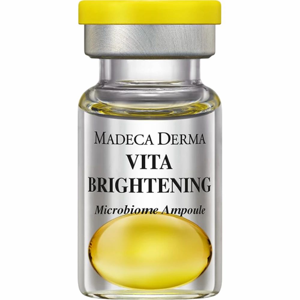 Glasampulle mit gelber Flüssigkeit. Beschriftung: MADECA DERMA VITA BRIGHTENING Microbiome Ampoule.
