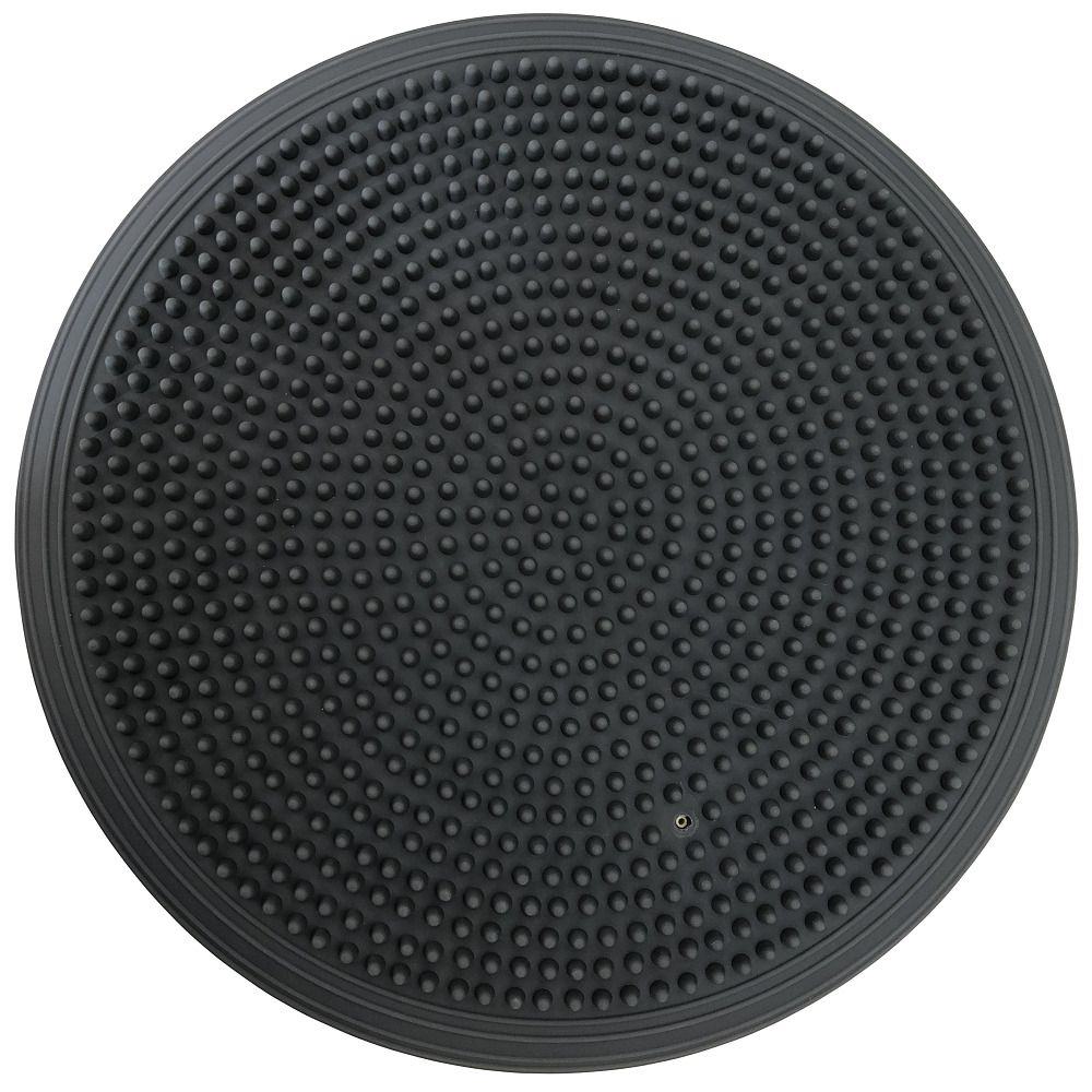 Schwarzes Balance-Kissen mit Noppen. Runde Form. Oberseite mit kleinen, erhabenen Punkten bedeckt.