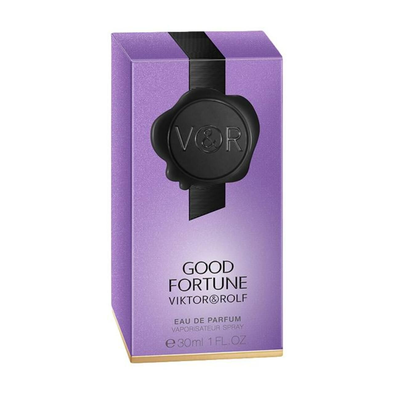 Violette Verpackung mit schwarzem Siegel und Aufschrift: Good Fortune Eau de Parfum Spray. Goldener Rand.