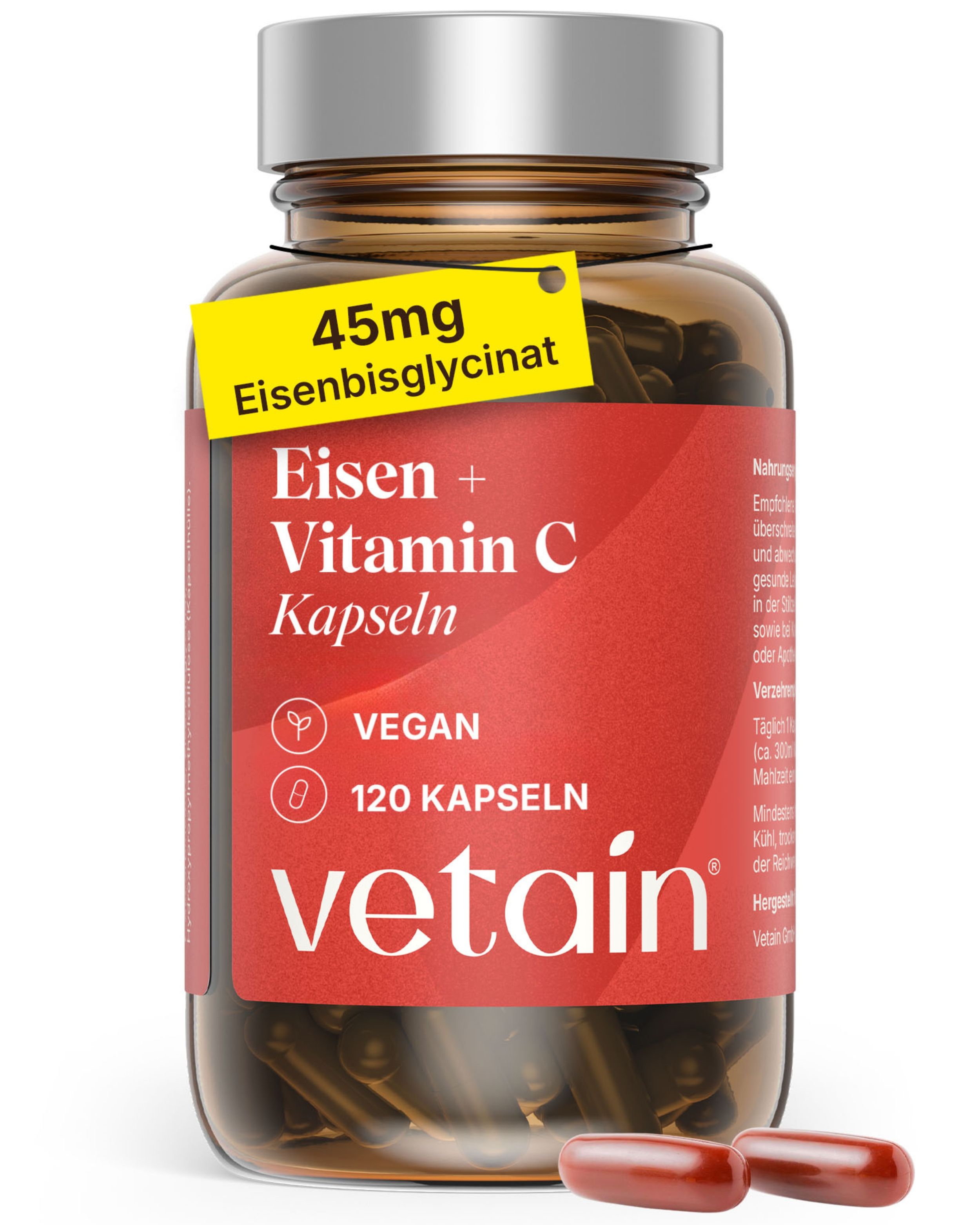 Braune Glasflasche mit roten Kapseln. Aufkleber mit Produktnamen, Inhaltsstoffen und Marke VETAIN. Gelbes Etikett mit 45mg Eisen.