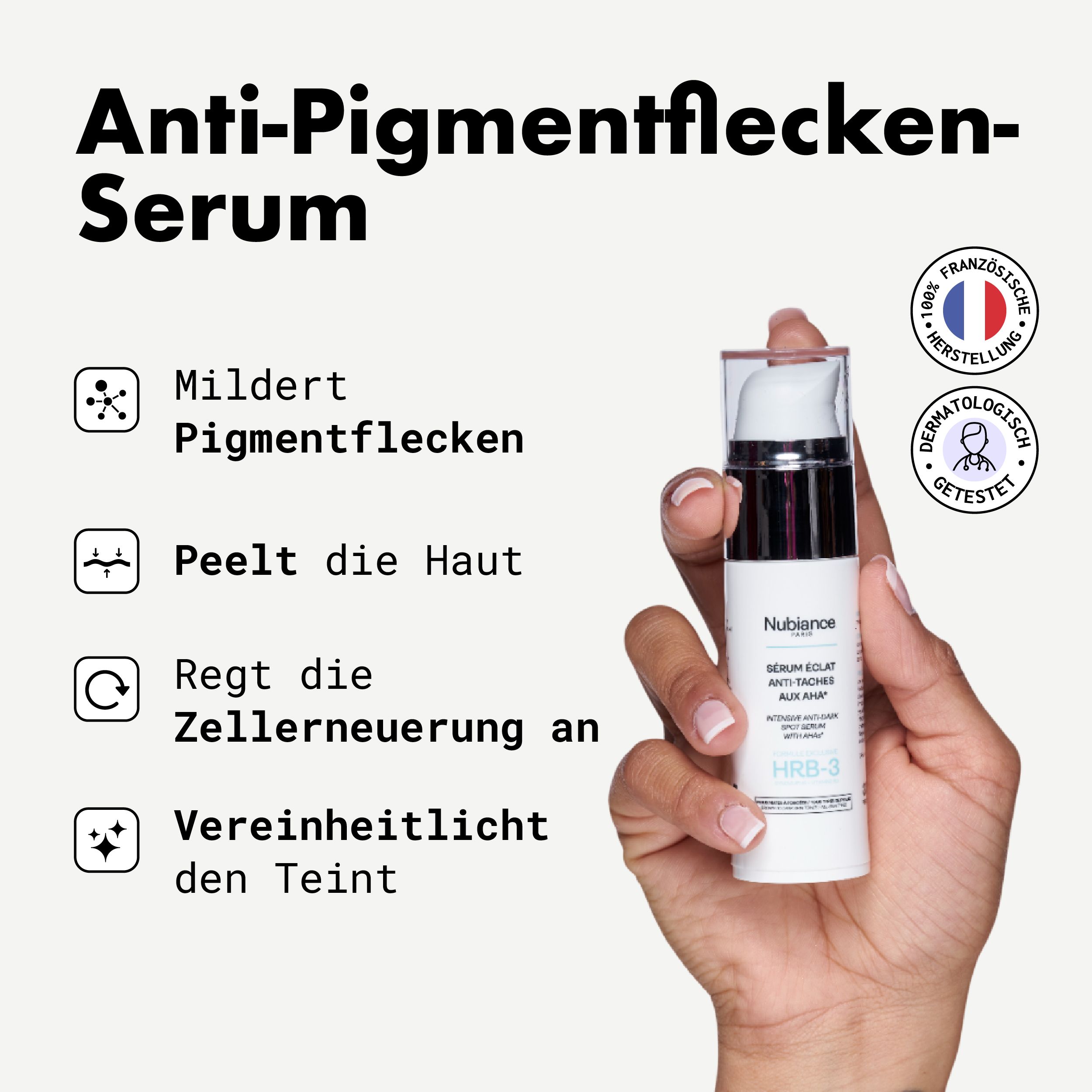 Hand hält Serumflakon. Text: Mildert Pigmentflecken, peelt die Haut, regt die Zellerneuerung an, vereinheitlicht den Teint.