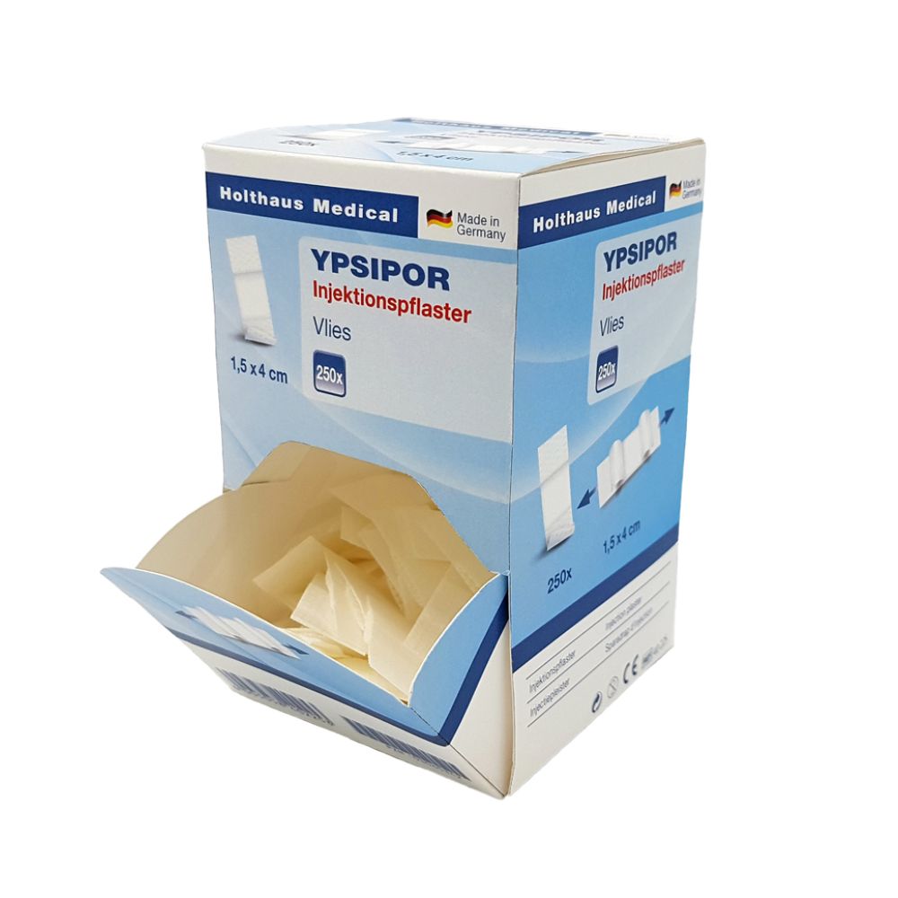 Karton mit YPSIPOR Injektionspflaster. Aufdrucke: Holthaus Medical, 1,5 x 4 cm, 250 Stück. Geöffnete Klappe mit Pflastern.