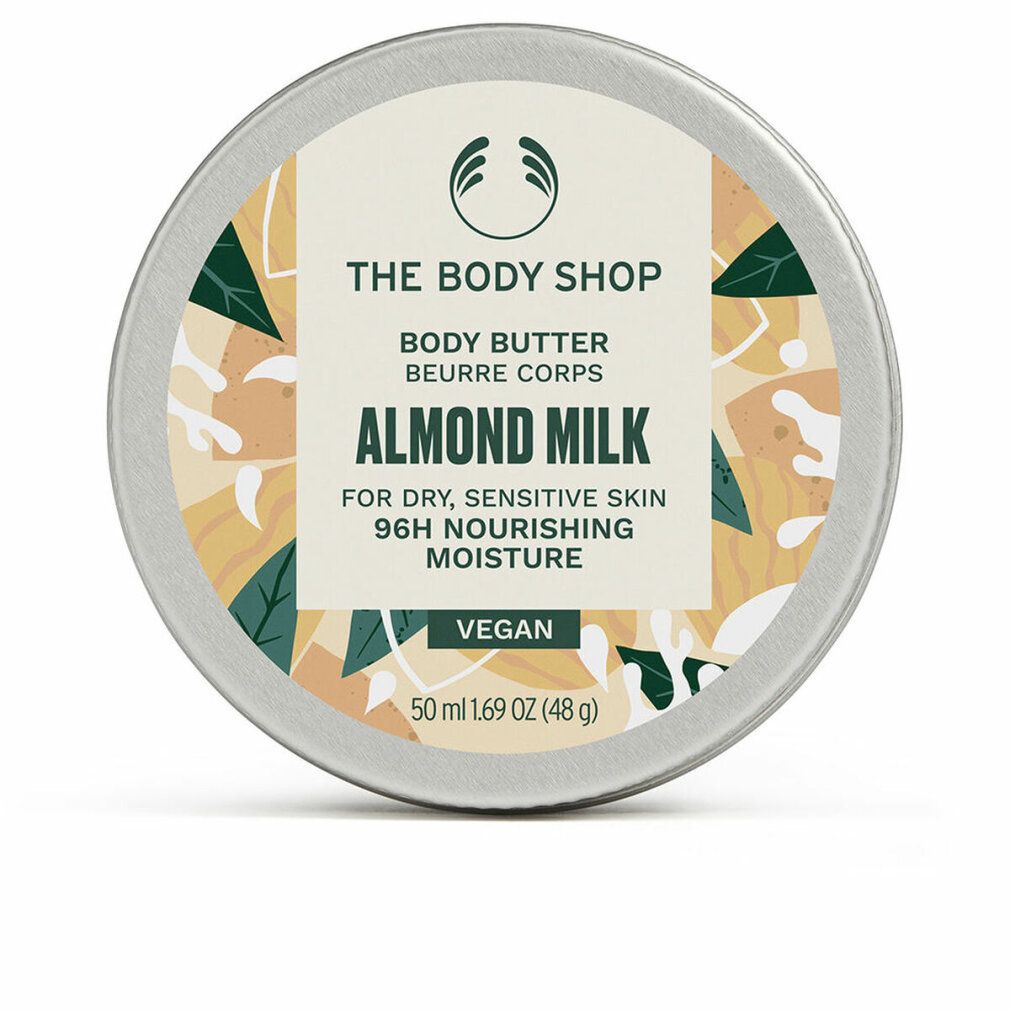 Runde Dose Body Butter von The Body Shop. Aufschrift: Almond Milk, für trockene, empfindliche Haut. Vegan. 50 ml.