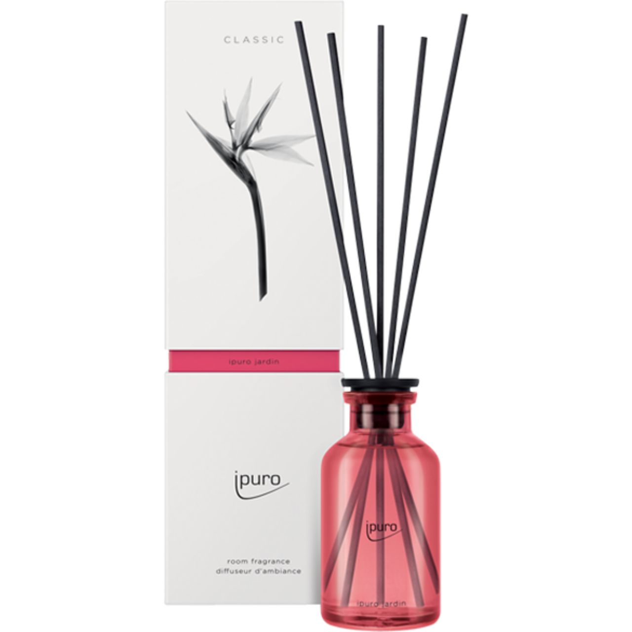 Raumduft-Diffusor mit schwarzen Stäbchen und rosa Flasche. Verpackung mit Logo und floralem Motiv.