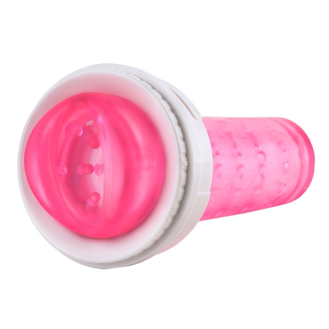 Zylindrisches Gerät mit rosa Innenleben und weißen Elementen. Sichtbare Öffnungen und Strukturen.