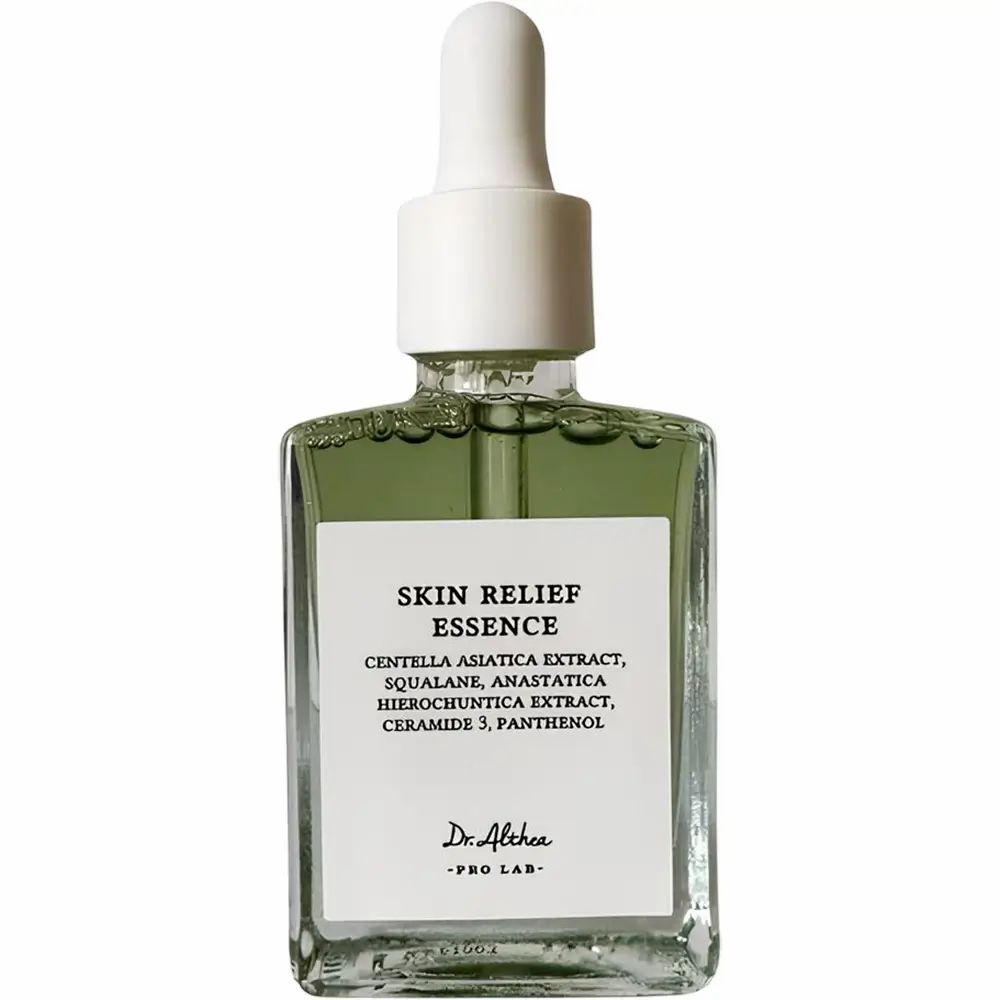 Glasflasche mit grünem Serum, Pipettenverschluss und weißem Etikett mit Produktinformationen.