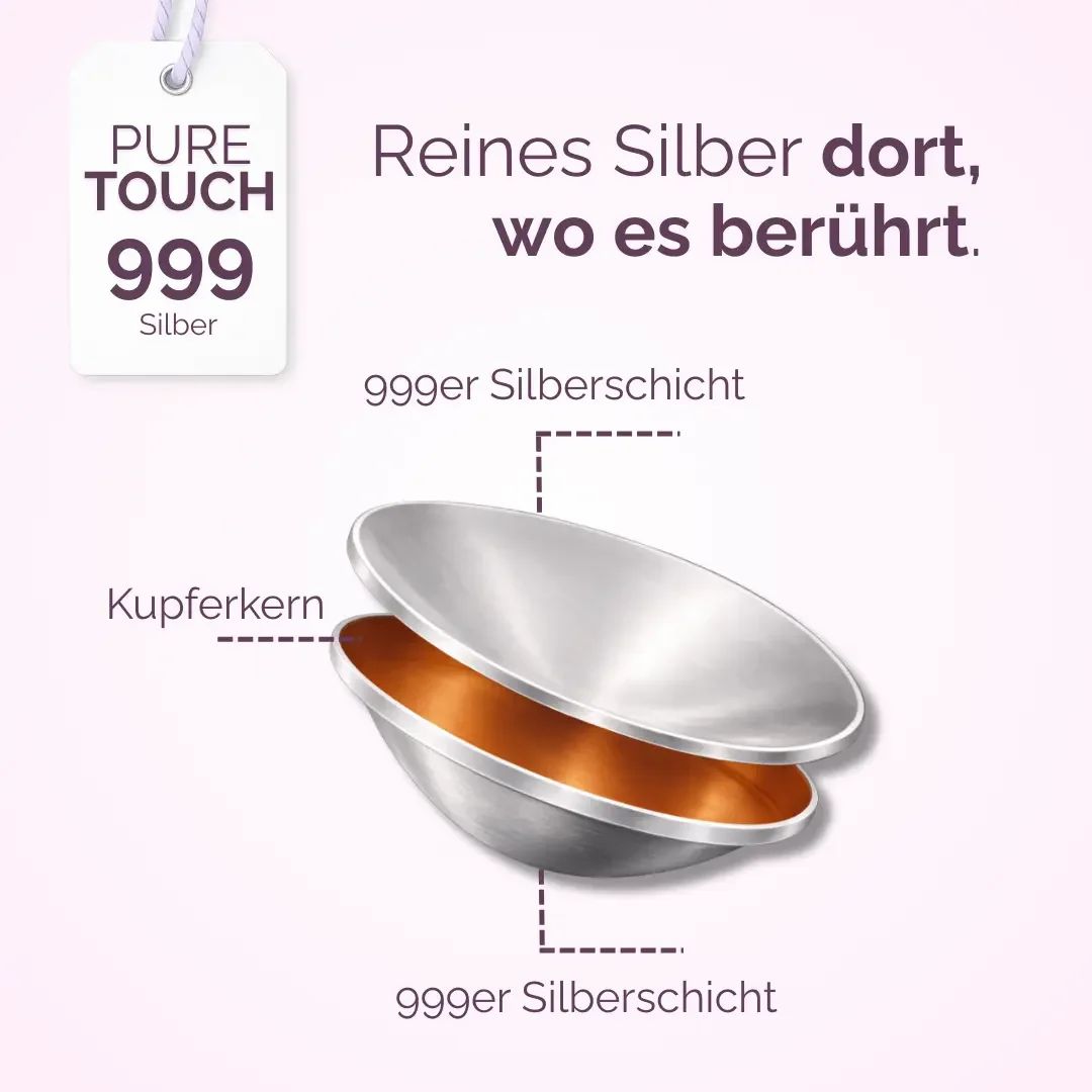 Zwei silberfarbene Schalen, eine mit Kupferkern. Beschriftung: 999 Silber, Kupferkern, 999 Silberschicht.