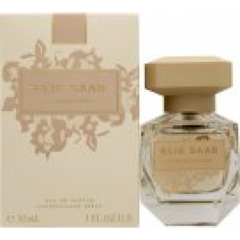 Parfümflasche und Schachtel. Flasche mit achteckigem Deckel, Schriftzug "ELIE SAAB". Schachtel mit floralem Muster und Schriftzug.