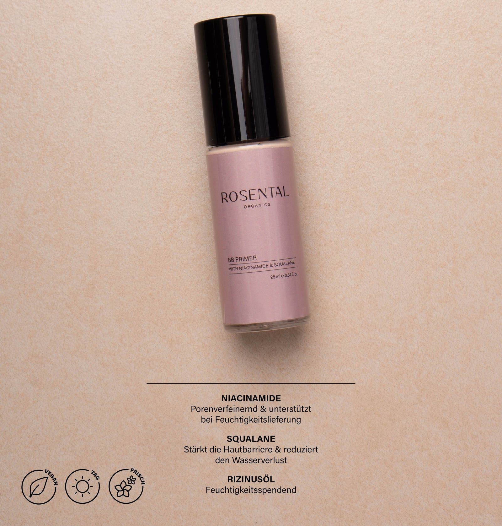 BB Primer-Flasche mit schwarzem Deckel. Rosa Flasche mit Text. Vegan-Siegel, Sonnensymbol, Tropfensymbol.
