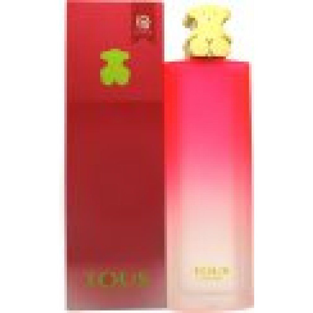 Eau de Toilette Spray mit roter Verpackung. Flakon mit Farbverlauf von Pink nach Weiß. Grüner Bär-Deckel. Tous-Logo.