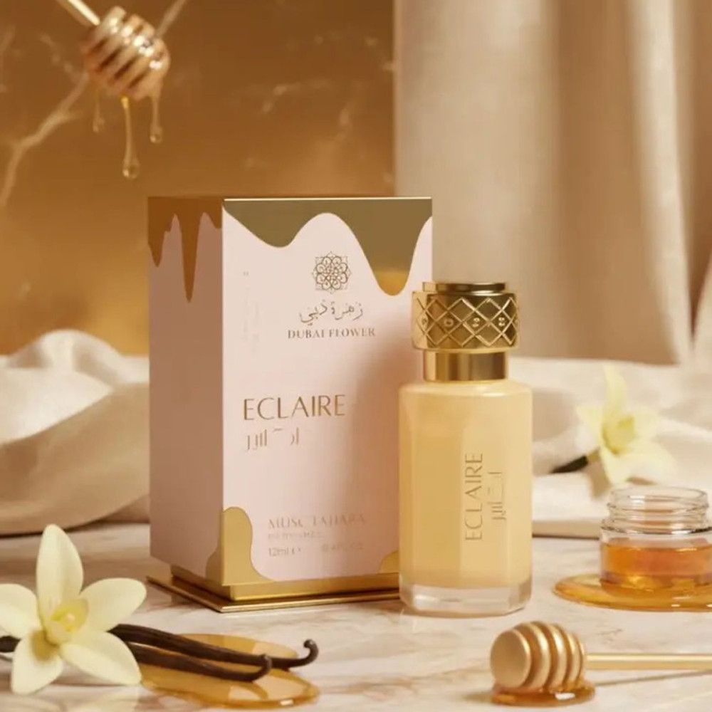 Produktflakon und Verpackung. Goldfarbene Verpackung mit Schriftzug. Flakon mit goldfarbenem Deckel. Honig und Vanille.