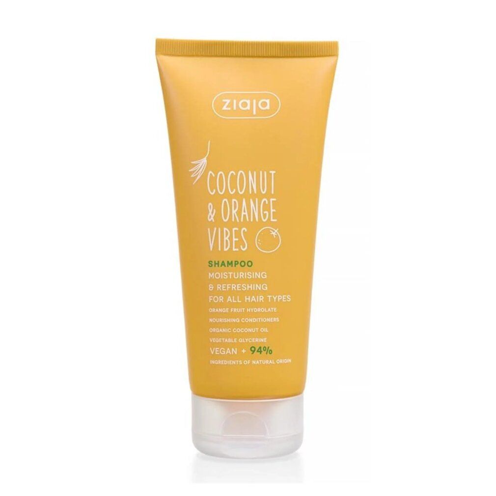 Gelbe Tube mit Shampoo. Aufschrift: Coconut & Orange Vibes, Shampoo, feuchtigkeitsspendend & erfrischend. Marke: Ziaja. Vegan + 94%.