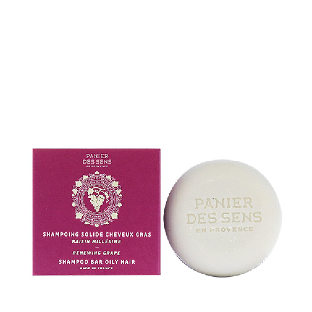 Runder Shampoo-Bar und rechteckige Verpackung. Verpackung mit Text und Logo "Panier des Sens".