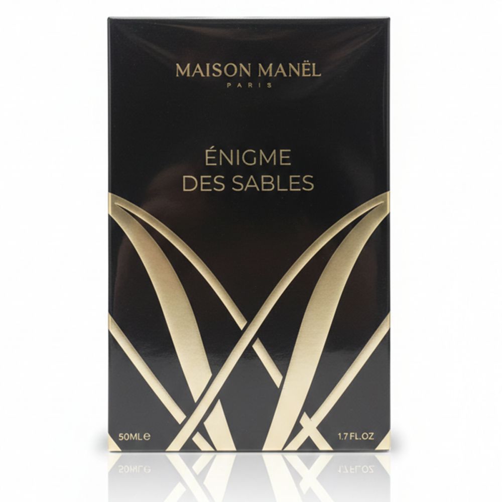 Schwarze Verpackung mit goldener Schrift: Maison Manel Paris, Énigme des Sables. Unten: 50ml, 1.7 FL.OZ.
