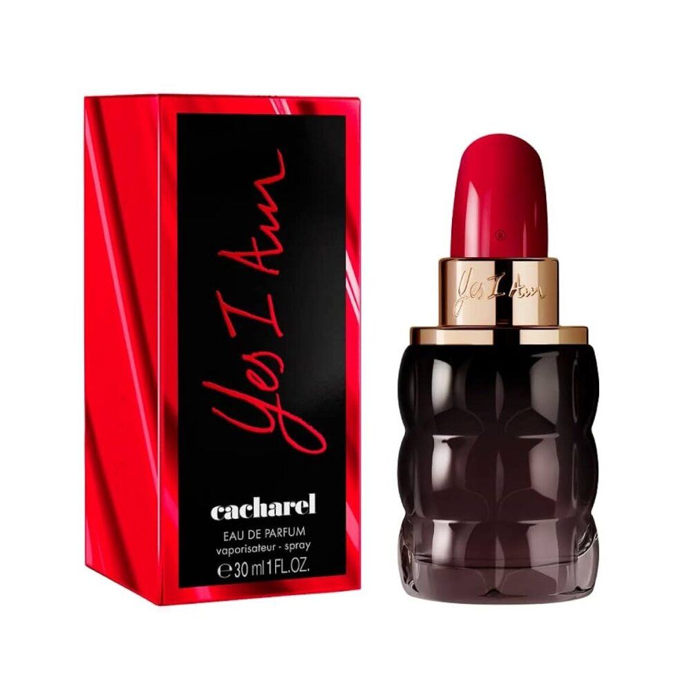 Rote Verpackung und schwarze, geriffelte Parfümflasche mit rotem Verschluss. Aufschrift 'Yes I Am' und 'Cacharel'.