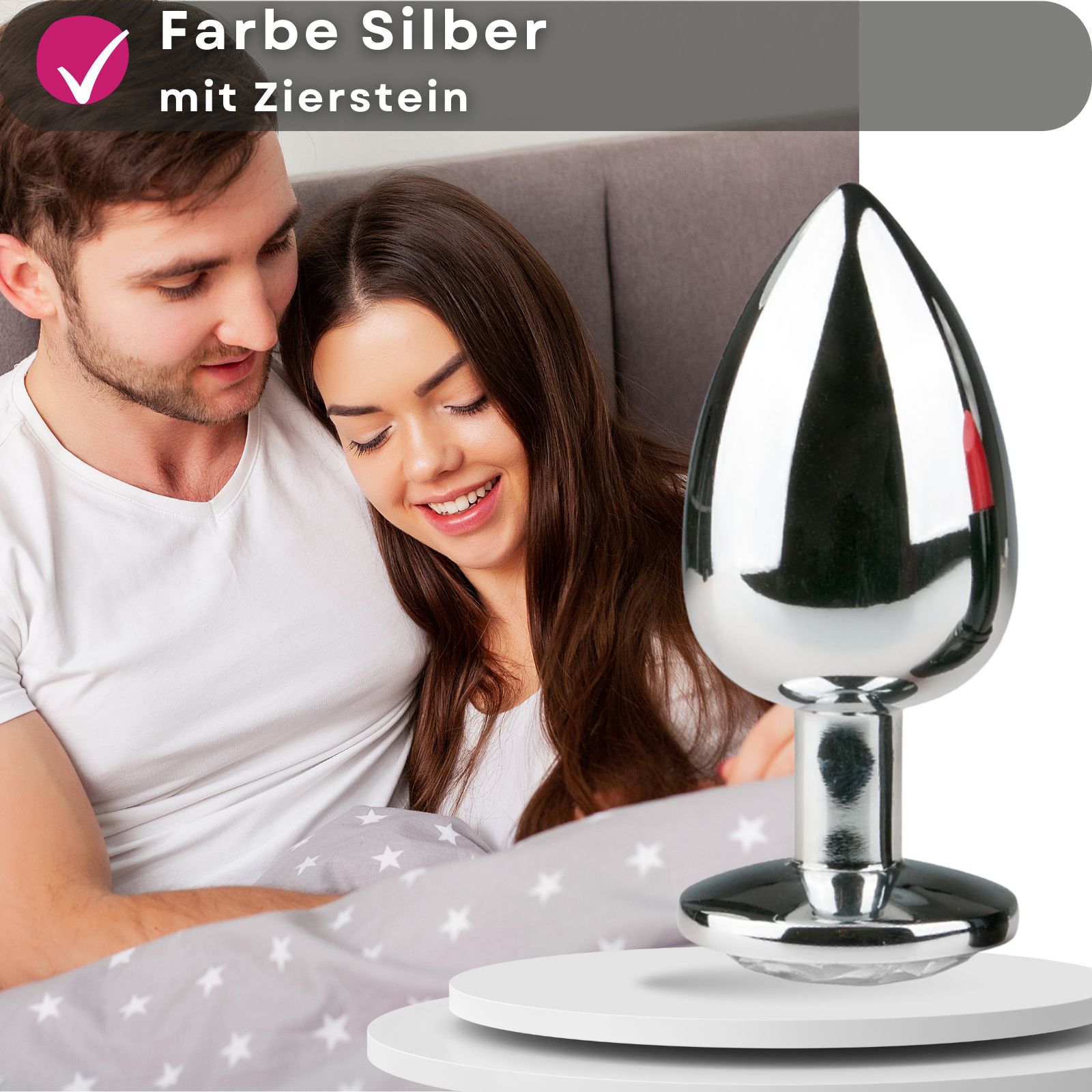Paar. Analplug mit Zierstein. Text: Farbe Silber mit Zierstein.