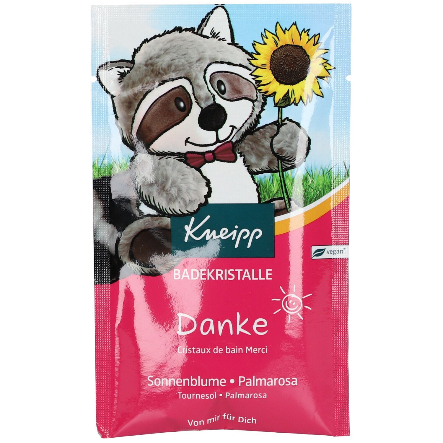 Rosa Beutel mit Aufdruck. Rabe mit Sonnenblume. Text: Kneipp Badekristalle Danke, Sonnenblume, Palmarosa. Vegan-Siegel.