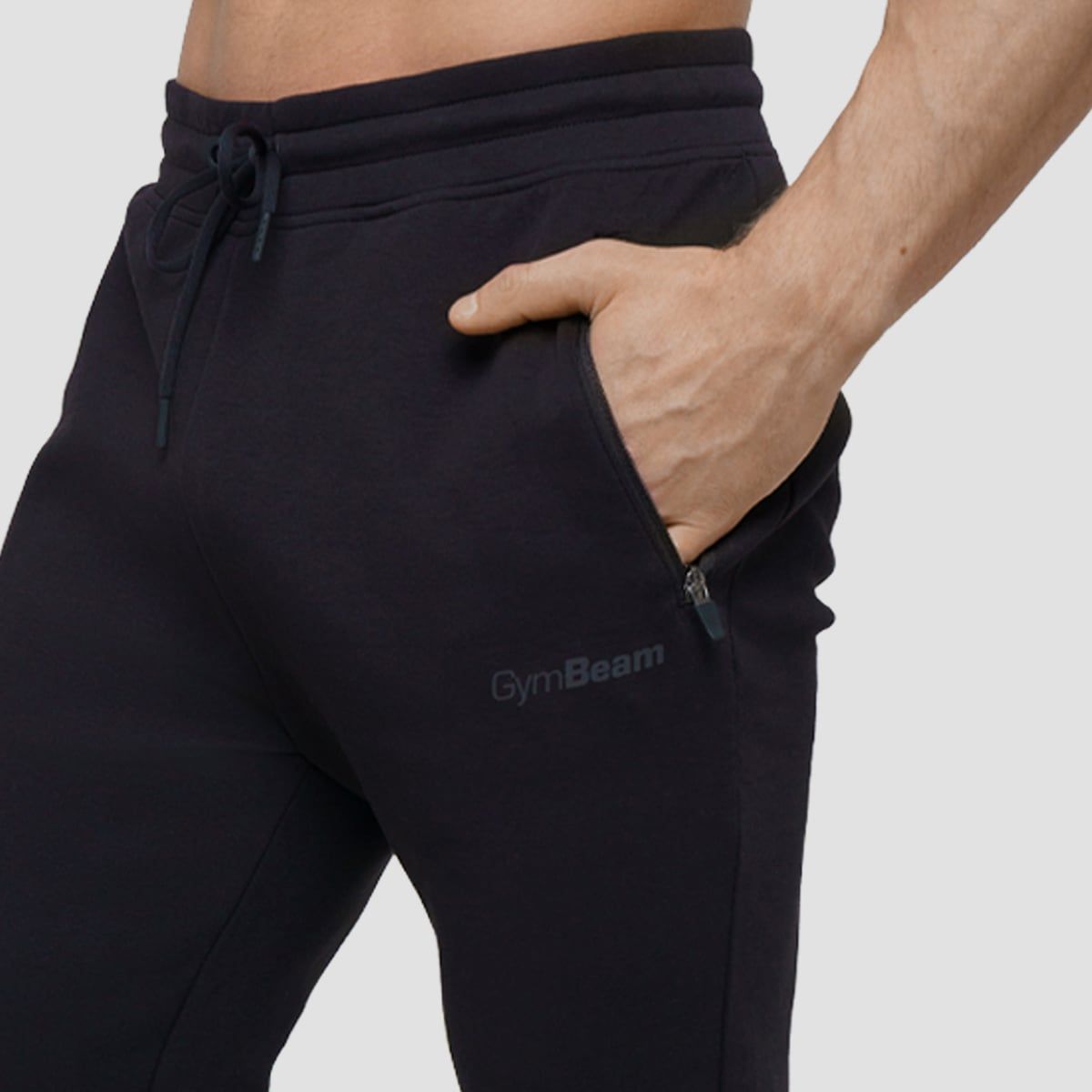 GymBeam Jogginghose Herren slim mit Kordelzug und Reißverschlusstaschen Onyx