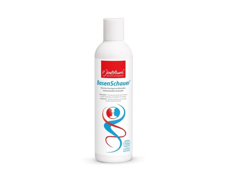 Weiße Flasche mit rotem Etikett. Aufschrift: Jentschura BasenSchauer. Abbildung zweier Personen. Kosmetik-Zertifizierung.