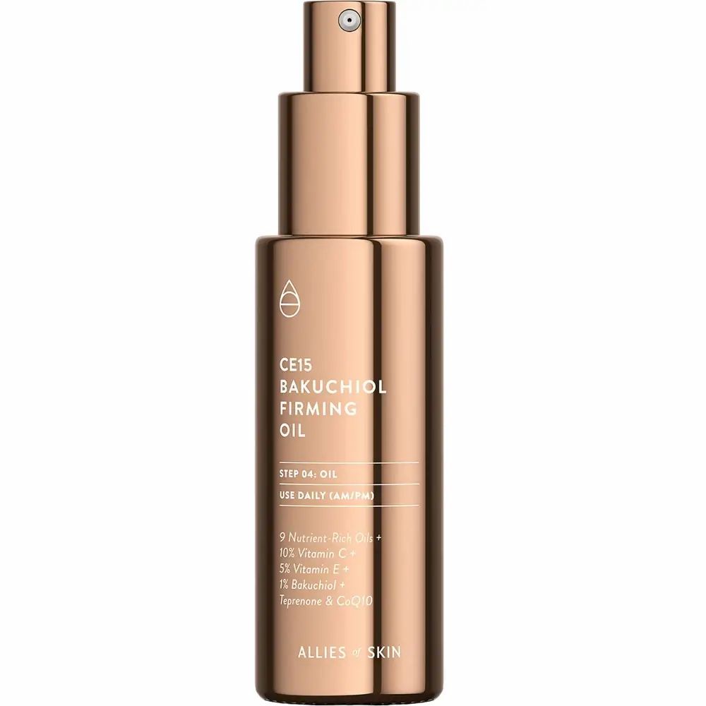 Kupferfarbene Ölflasche mit Produktnamen und Inhaltsstoffen. Auf weißem Hintergrund.