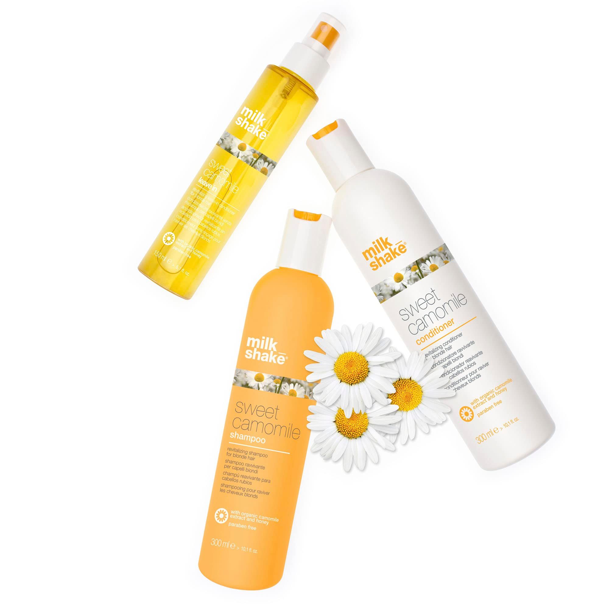 Drei Flaschen: Shampoo, Conditioner und Spray. Text: milk_shake, sweet camomile. Mit Kamillenblüten.