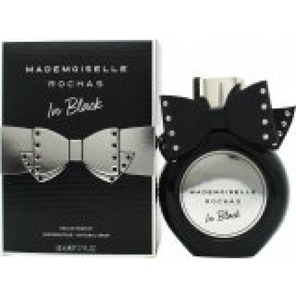 Schwarze Flasche mit Schleife und Verpackung. Aufschrift: Mademoiselle Rochas In Black. Flakon mit silbernem Verschluss.