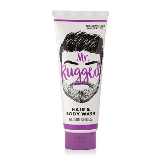 Wit-paarse tube met baardillustratie. Tekst: Mr. Rugged, Hair & Body Wash. Merk: The Somerset Toiletry Co.