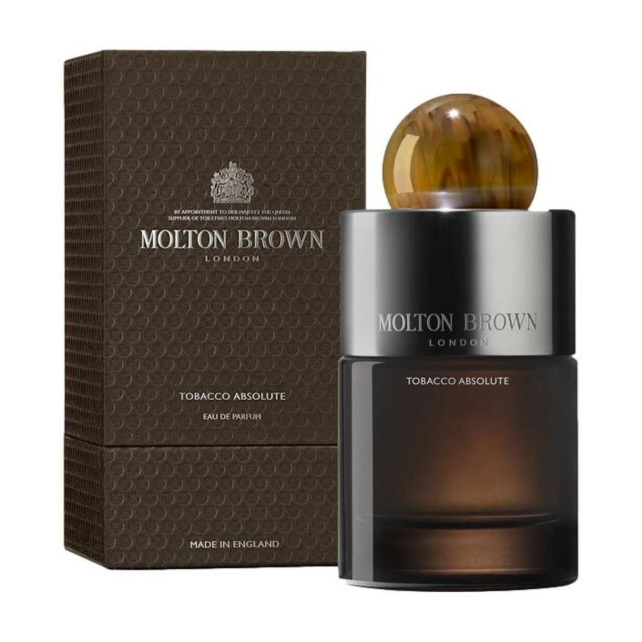Dunkelbraune Schachtel und Flakon. Aufschrift: Molton Brown, Tobacco Absolute, Eau de Parfum. Hergestellt in England.