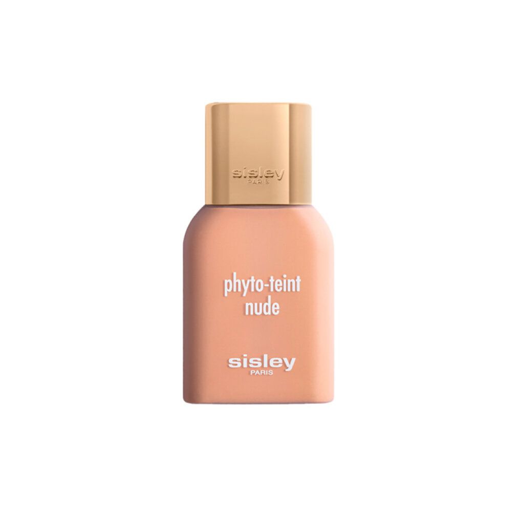 Beige Flasche mit goldfarbenem Deckel. Aufschrift: Phyto-Teint Nude und Sisley Paris.