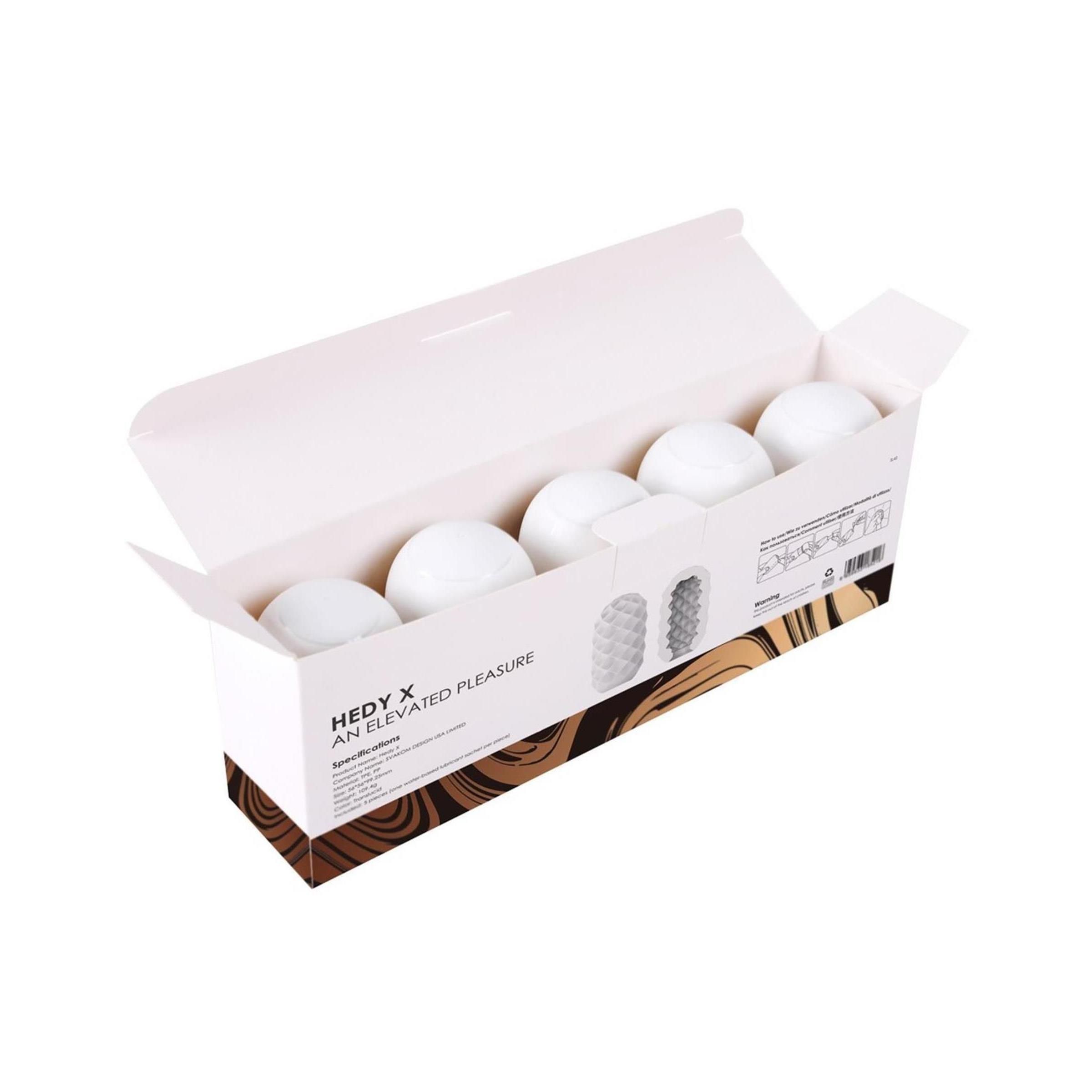 Rechteckige Verpackung mit dem Produktnamen Svakom Confidence. Das Design zeigt eine marmorierte Optik in Gold- und Brauntönen.