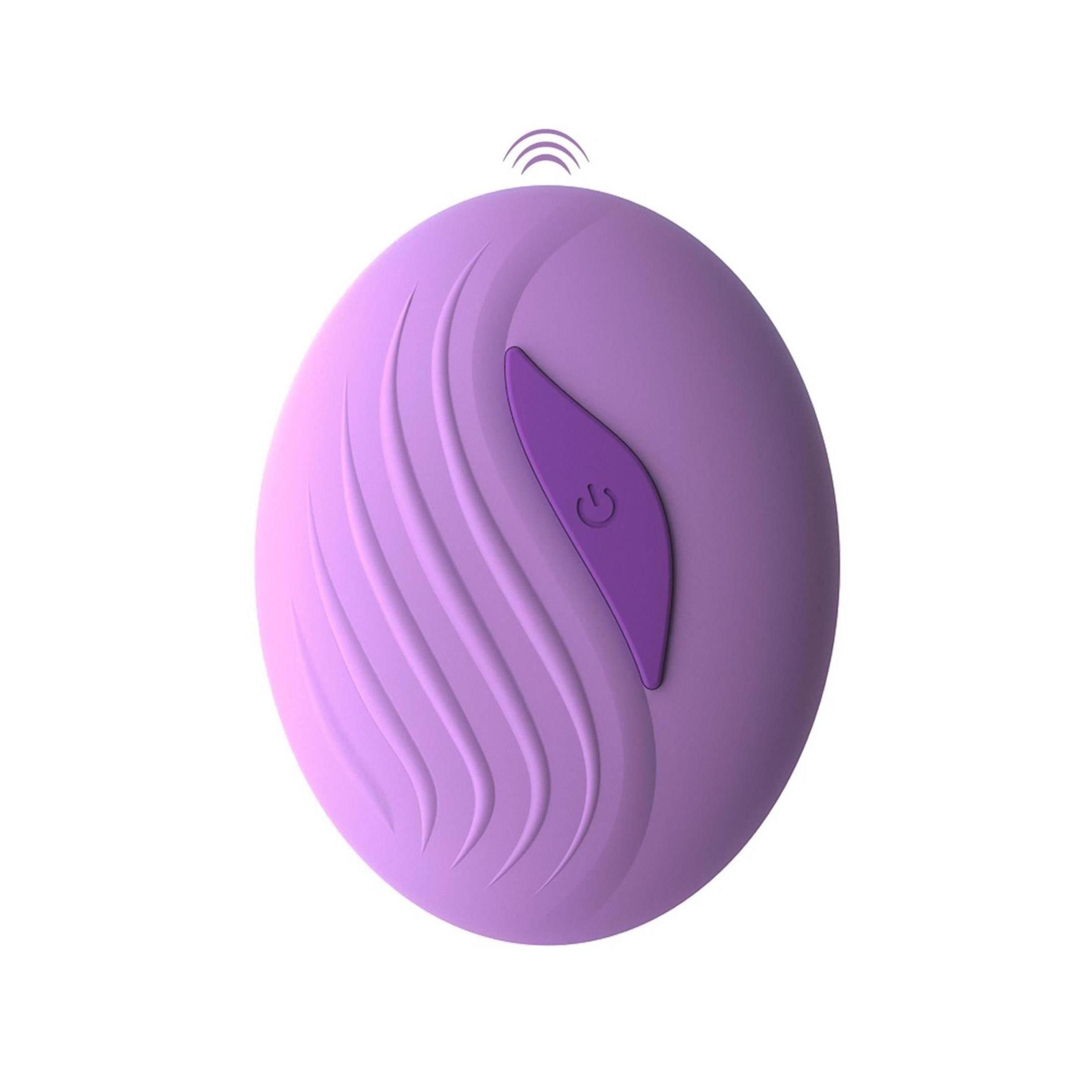 Lila Fernbedienung mit Wellenmuster und Power-Taste. Funk-Symbol.