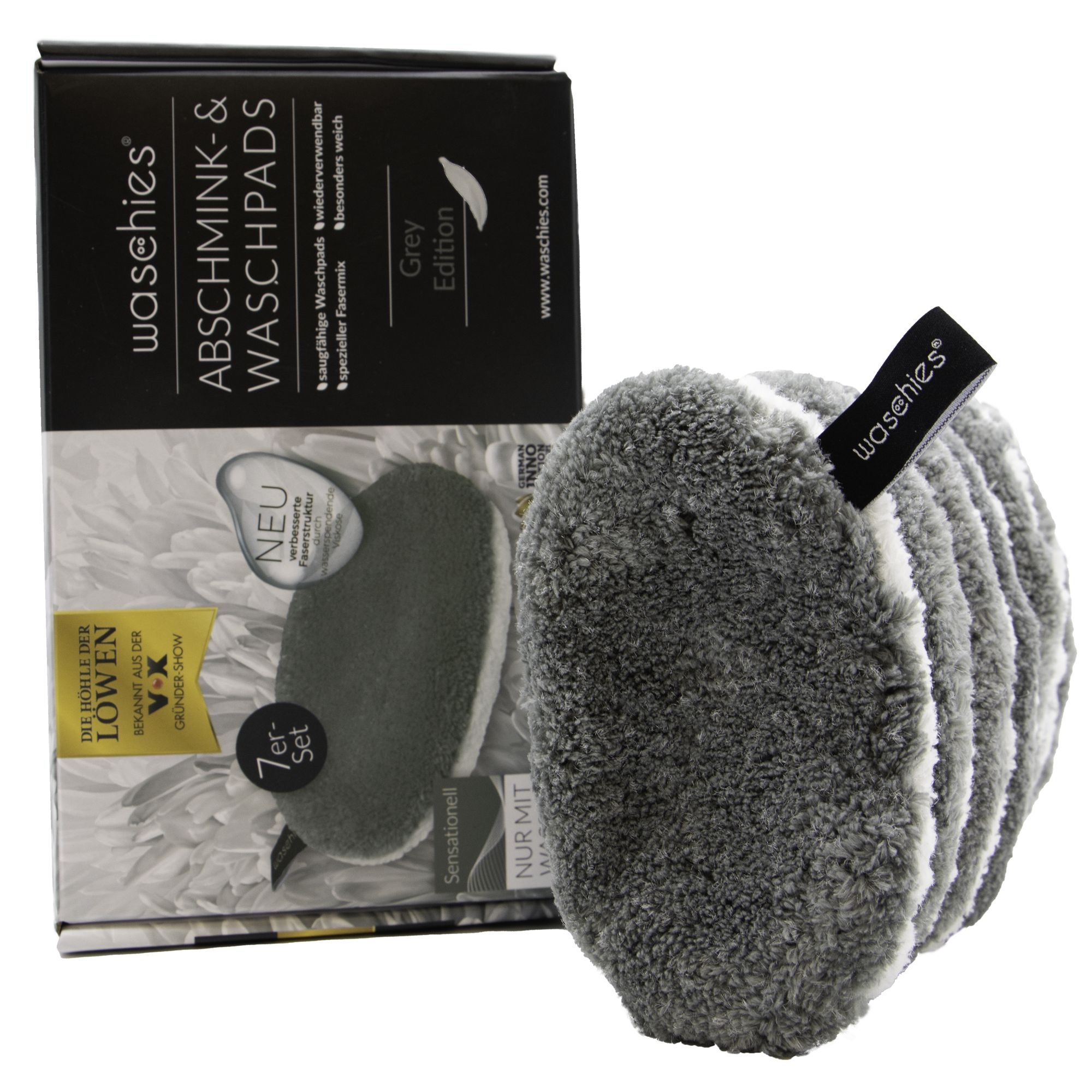 Graues Abschminkpad-Set mit 7 Pads und Verpackung. Pads mit weißem Rand und schwarzem Label. Verpackung mit Produktnamen und Logo.