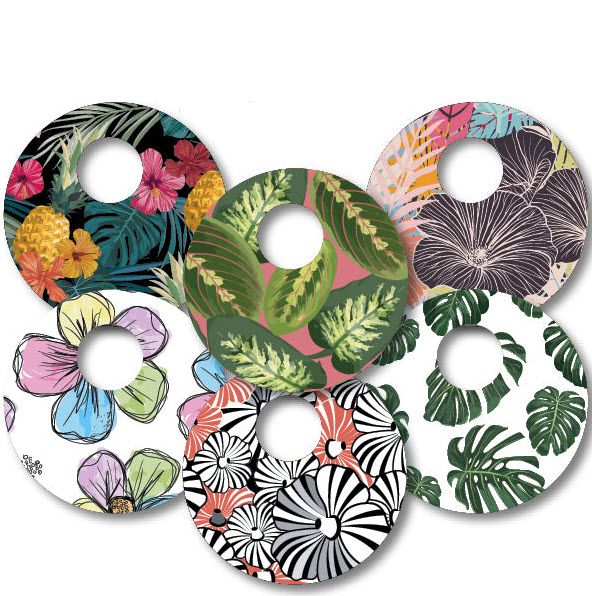 Sechs runde Aufkleber mit Loch in der Mitte. Verschiedene Designs: Blumen, Blätter, Ananas. Für medizinische Geräte.