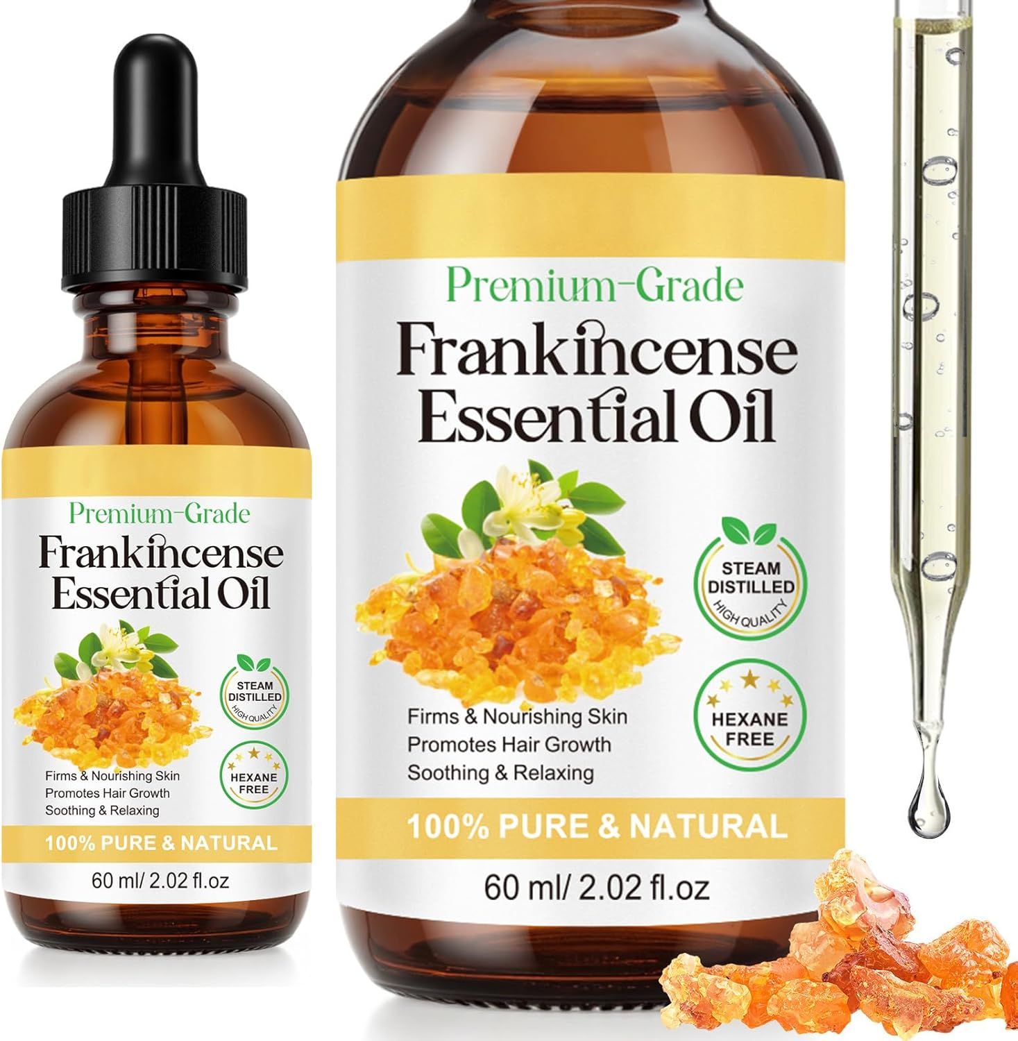Zwei Flaschen Frankincense Essential Oil. Eine mit Pipette, eine ohne. Aufschrift: Premium-Grade, 100% Pure & Natural, 60 ml.