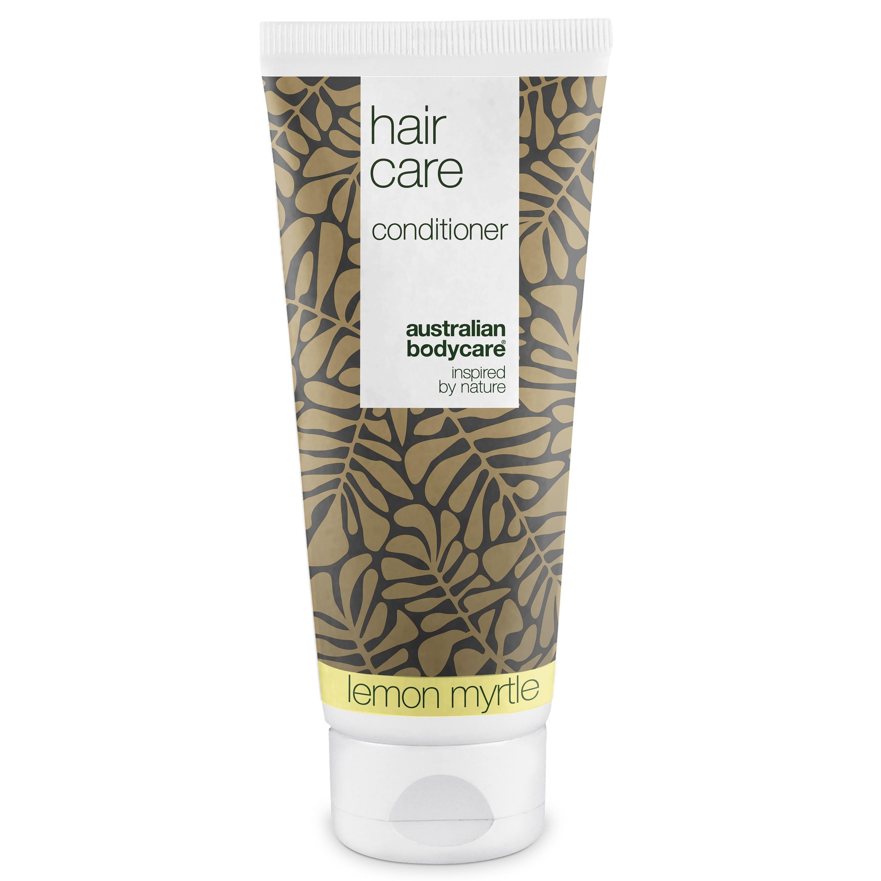Haarconditioner tube. Witte dop, gouden patroon. Opschrift: Hair Care, Australian Bodycare, Lemon Myrtle.