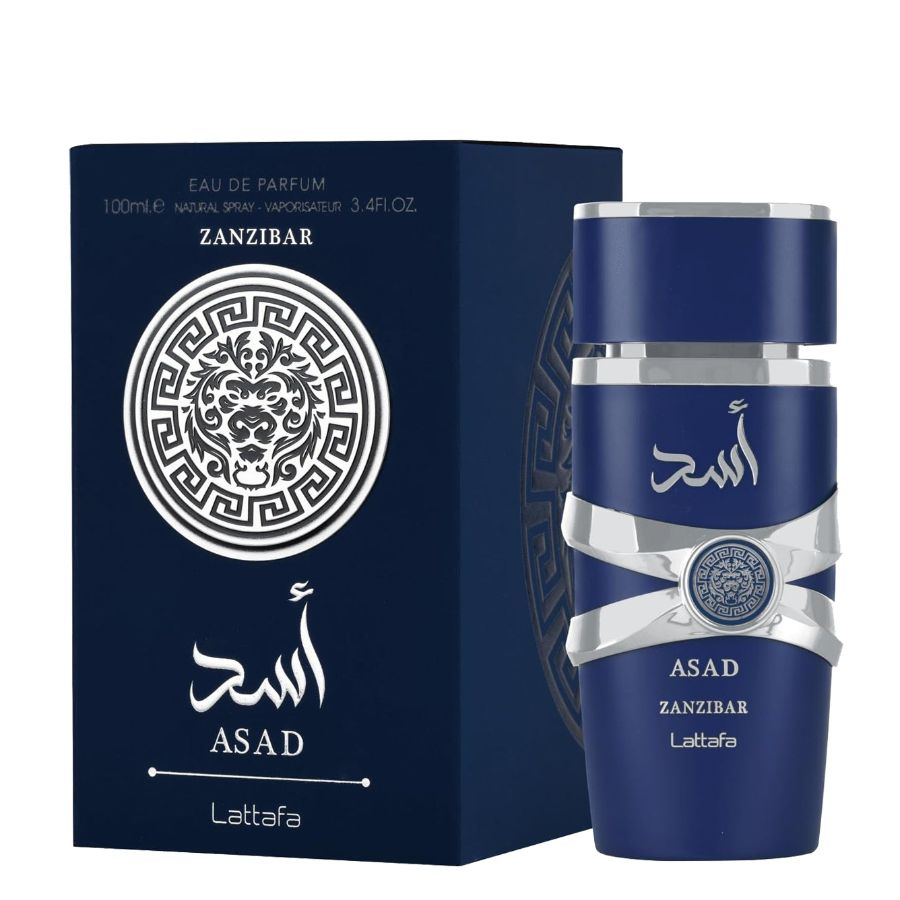 Dunkelblaue Parfumflasche und -verpackung. Aufschrift: Asad Zanzibar, Lattafa. Flasche mit silbernen Akzenten und arabischer Schrift.
