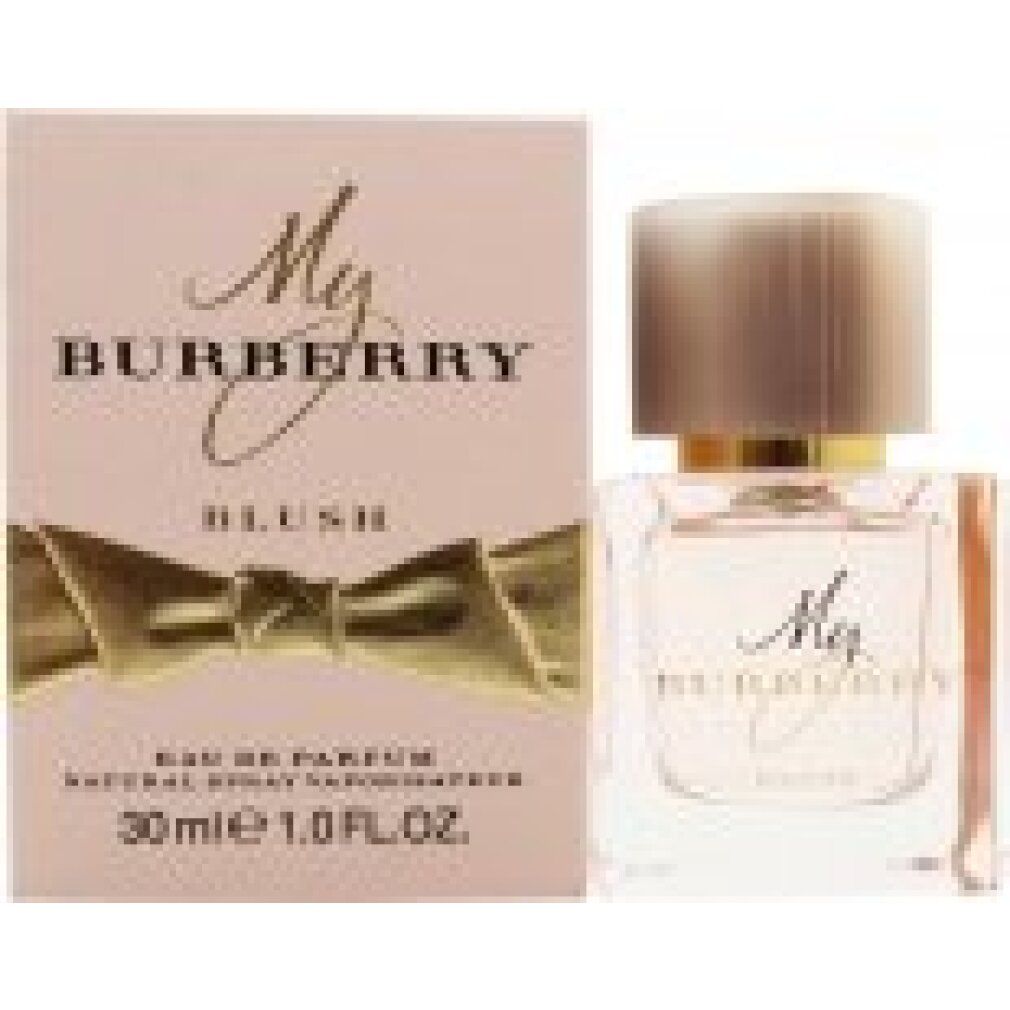 My Burberry Blush Eau de Parfum Flakon mit rosa Kappe und Schleife, neben der Verpackung.