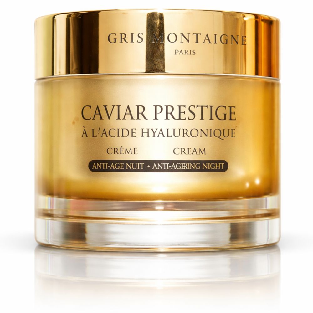 Goldfarbener Tiegel mit Creme. Beschriftung: Caviar Prestige, à l'Acide Hyaluronique, Crème, Anti-Age Nuit.