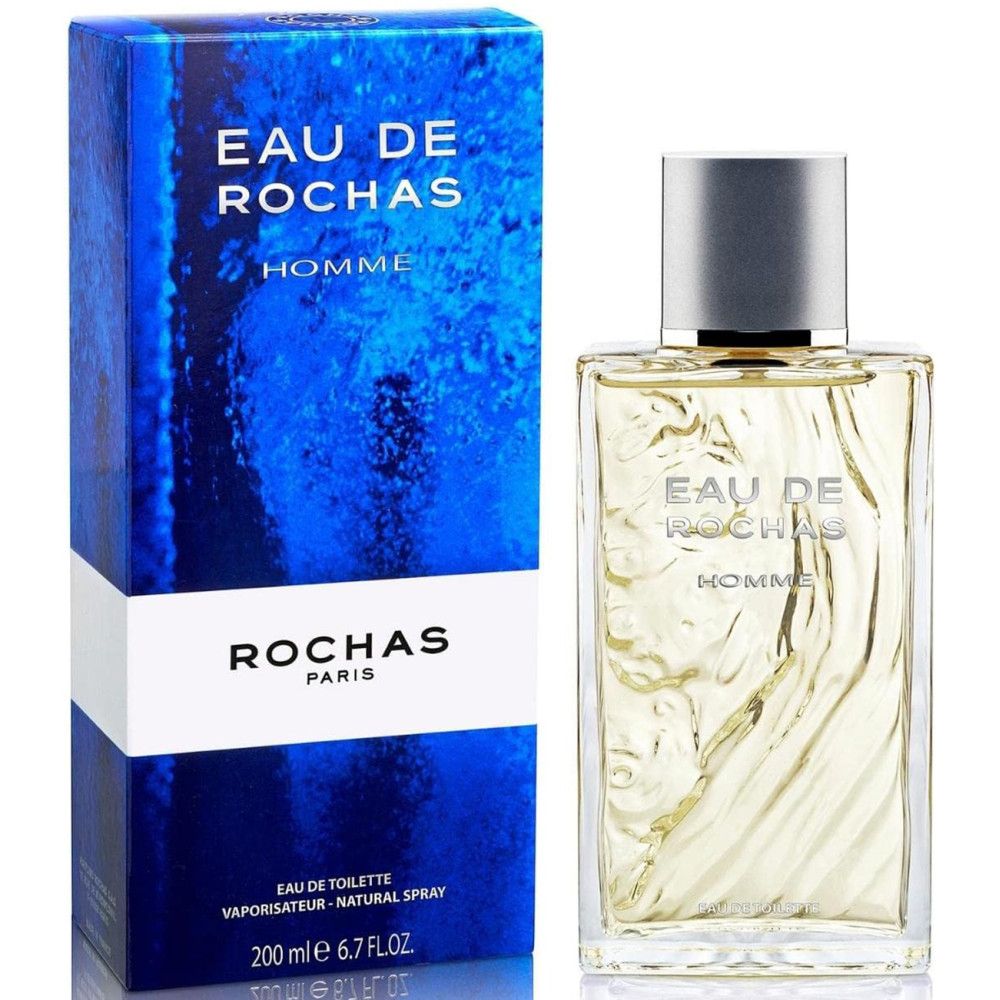 Eau de Rochas Homme Eau de Toilette Spray. Rechteckiger Glasflakon mit silbernem Deckel und blauer Verpackung mit weißem Logo.