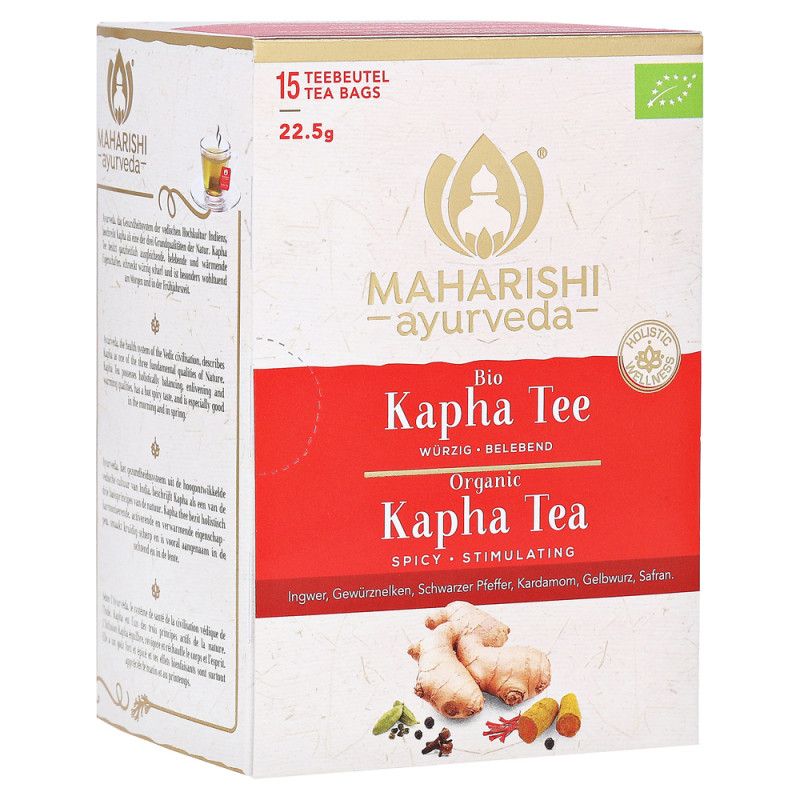 Verpackung von Maharishi Kapha Tee. Weiß-rote Schachtel mit Logo, Text und Zutaten. 15 Teebeutel, Bio-Siegel.