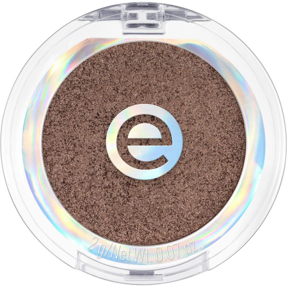 Runder Lidschatten in transparenter Verpackung. Brauner Lidschatten mit Logo. Unten steht "2 g/Net Wt. 0.07 oz.".