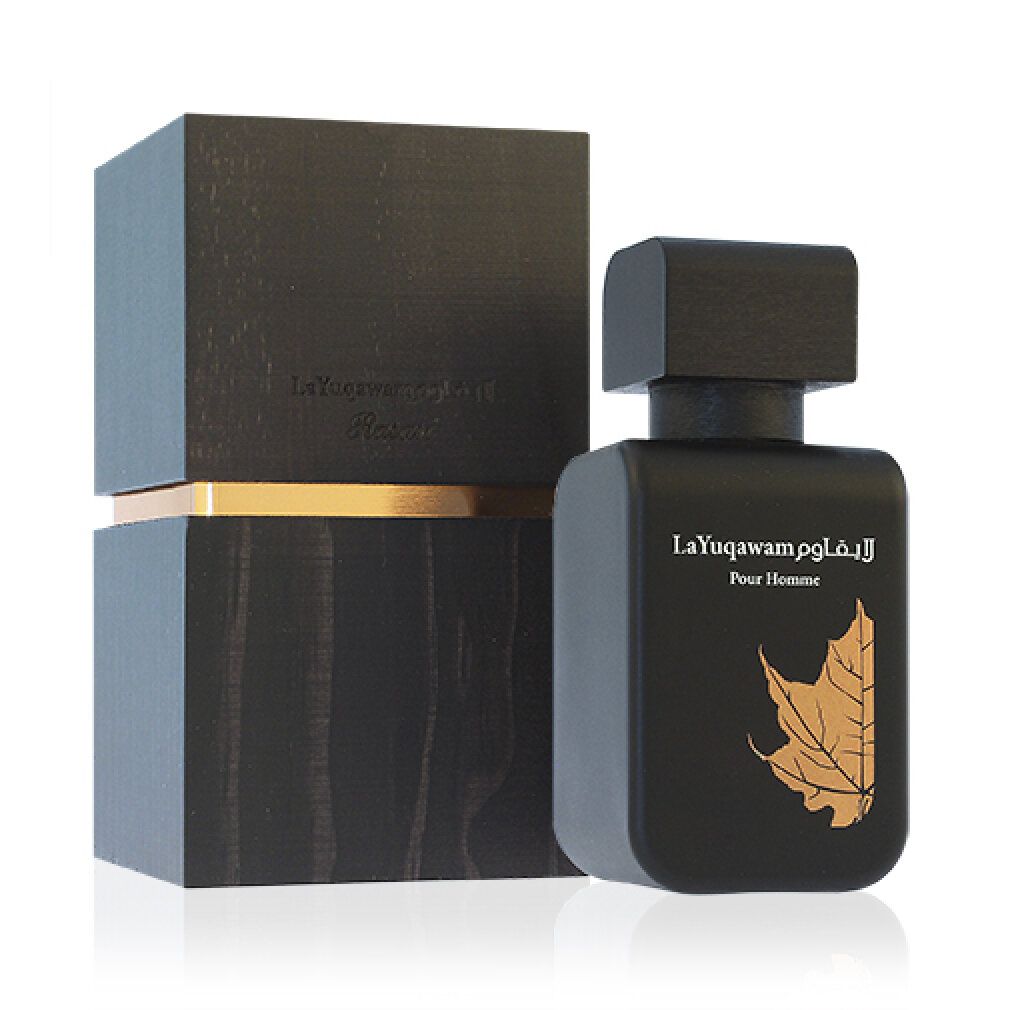 Schwarze Flasche und Verpackung. Aufschrift La Yuqawam Pour Homme. Blatt-Design. Holzoptik.
