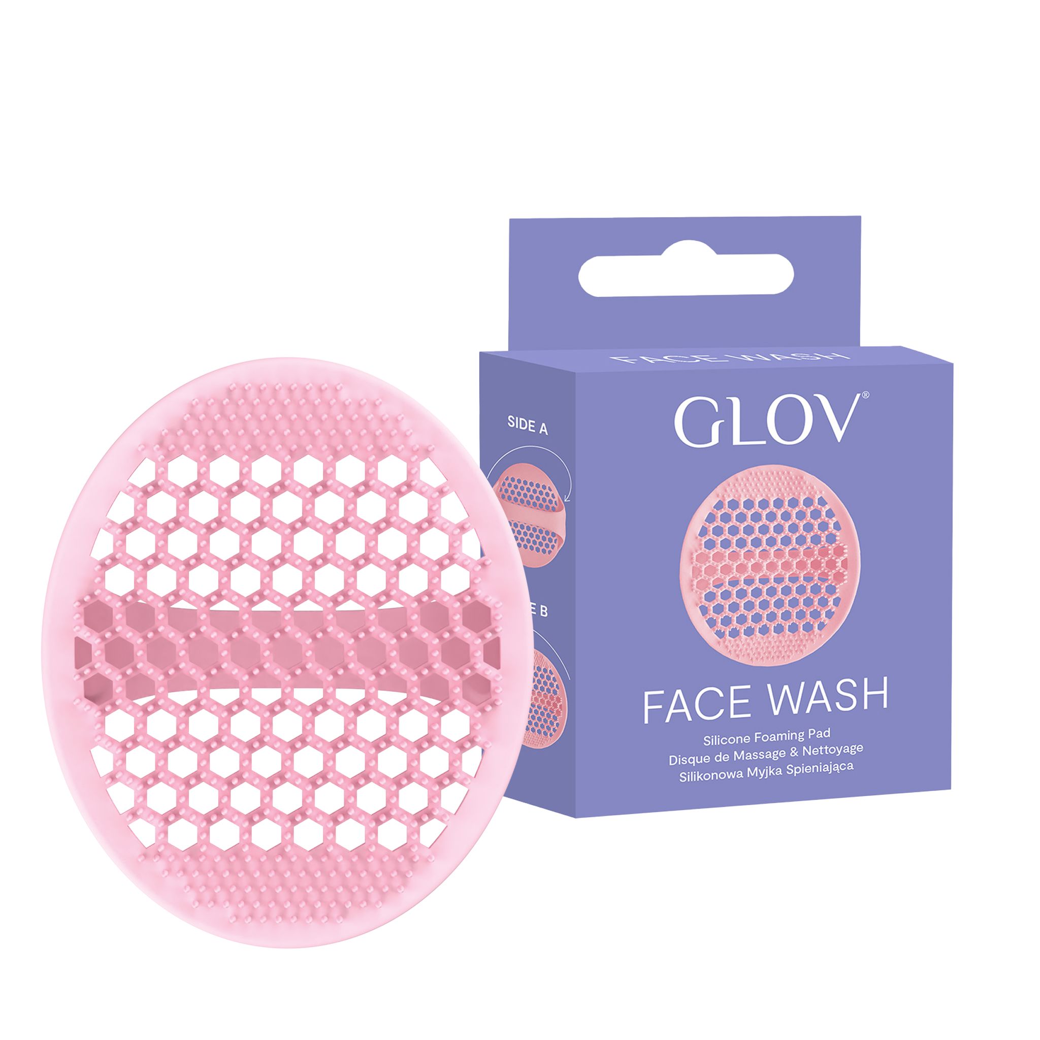 Ein rosa Reinigungsaufsatz mit wabenartiger Struktur neben einer rosa und lila Verpackung mit "GLOV FACE WASH".