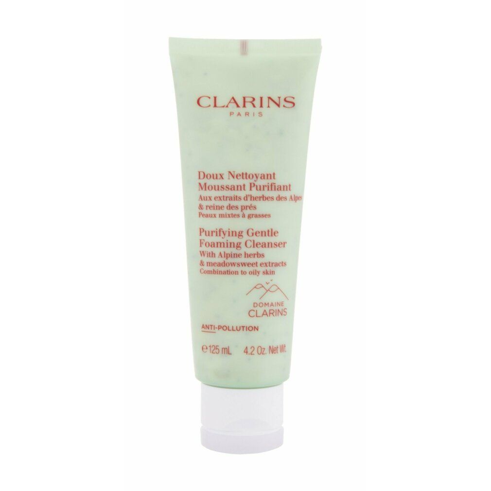 Grüne Tube mit Produkttext. Marke Clarins. Aufschrift: Doux Nettoyant Moussant Purifiant. Mit Alpenkräutern und Wiesensüß-Extrakten.