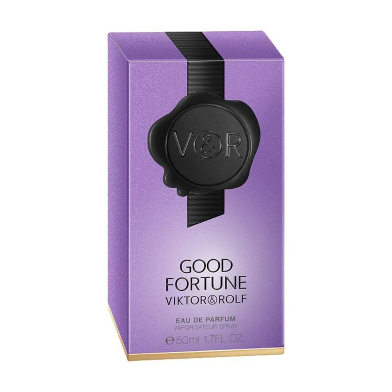 Violetter Karton mit schwarzem Siegel. Aufschrift: GOOD FORTUNE VIKTOR & ROLF. Flakon-Aufdruck: GOOD FORTUNE.