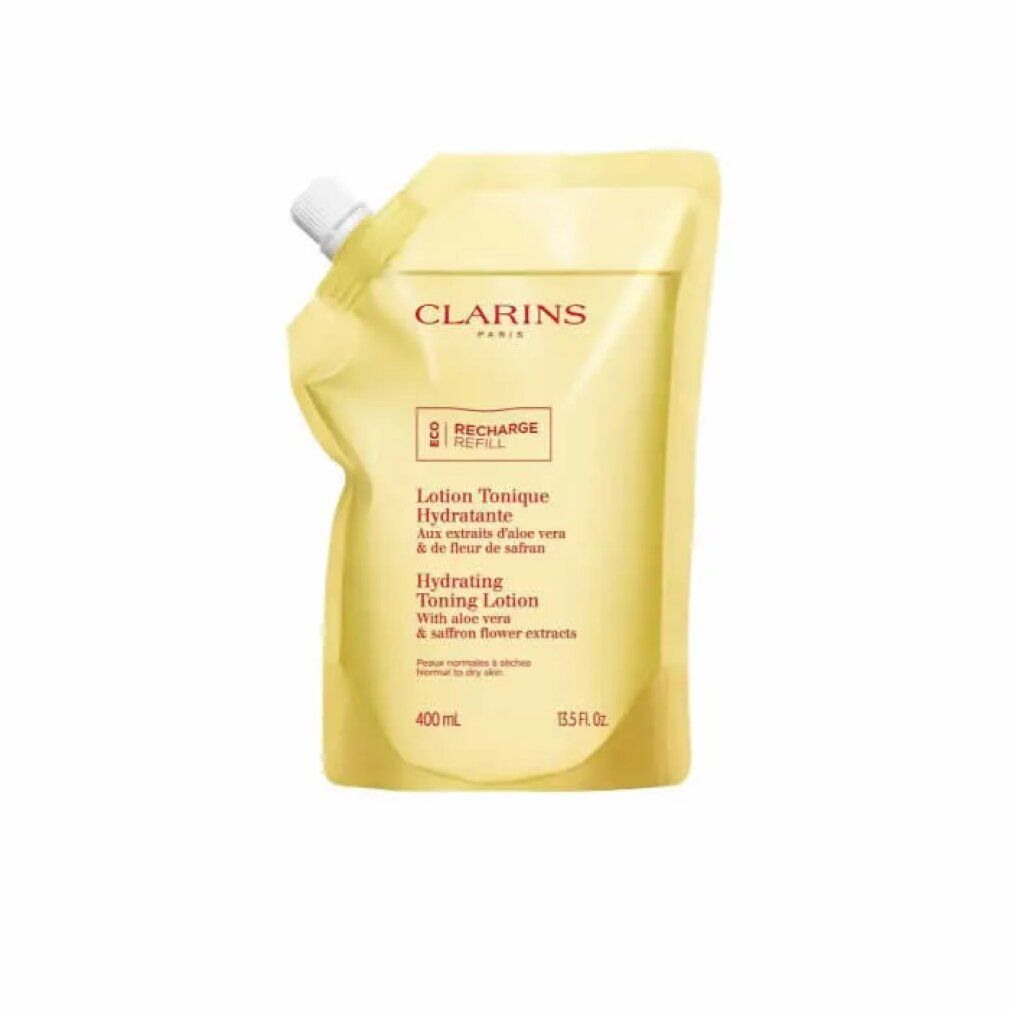 Nachfüllpackung für Gesichtswasser. Gelbe Verpackung mit weißem Verschluss. Text: Clarins, Lotion Tonique Hydratante, 400 ml.