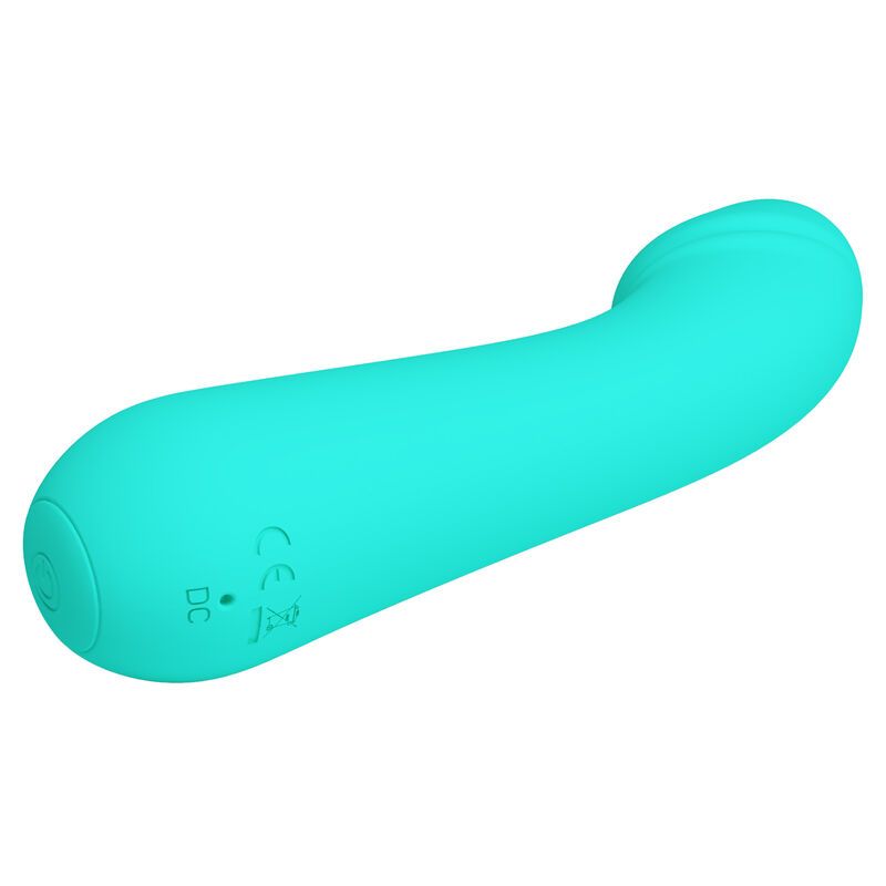 Türkisfarbener Vibrator mit gebogener Form. Unterseite mit Knöpfen und Anschlüssen. Glatte Oberfläche.
