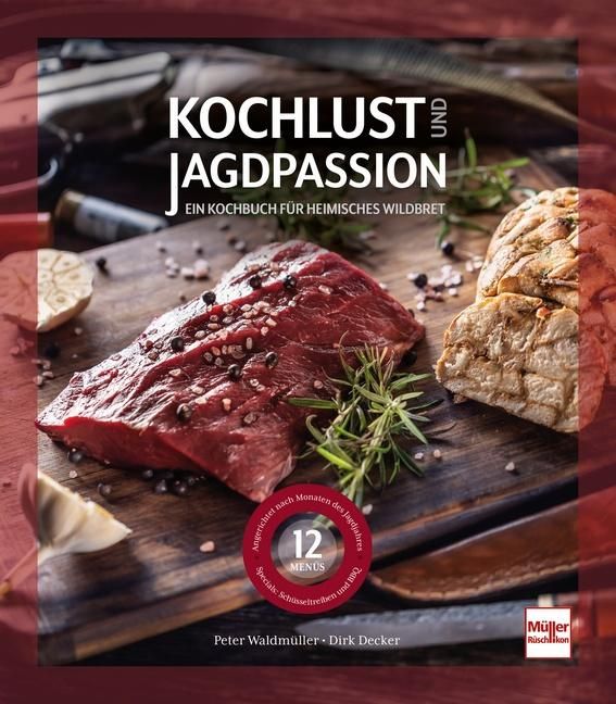 Kochbuch "Kochlust und Jagdpassion" mit Wildbret. Auf Holzbrett, Fleisch, Brot, Kräuter und Knoblauch. 12 Menüs.