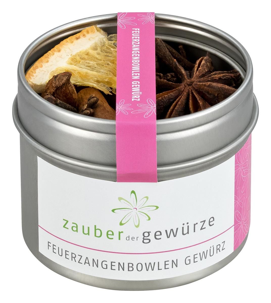 Runde Dose mit Gewürzen. Rosa Etikett mit Schriftzug. Enthält Anis, Zimtstangen, Nelken und Orangenscheibe.